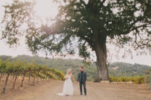 HammerSky Wedding Photo of Bride and Groom in front of oak tree